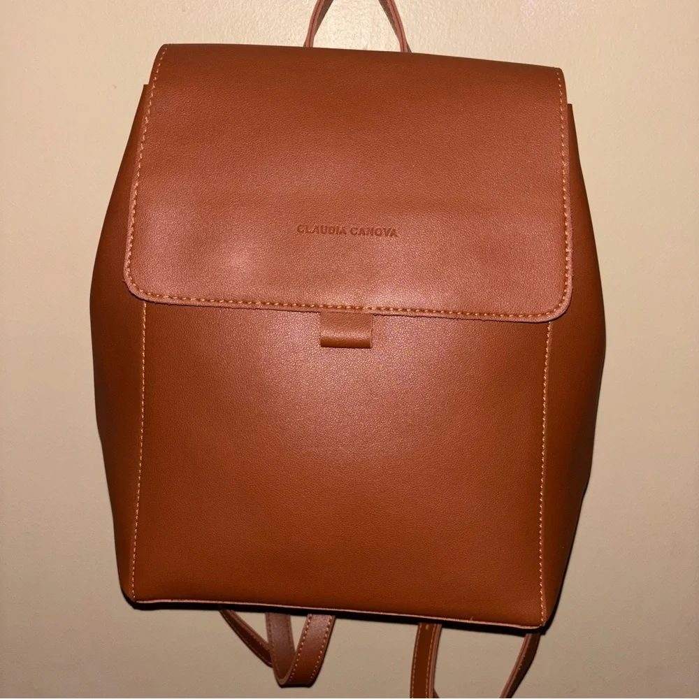 Claudia Canova Unlined Flapover Backpack Tan Faux Leather Minimalist